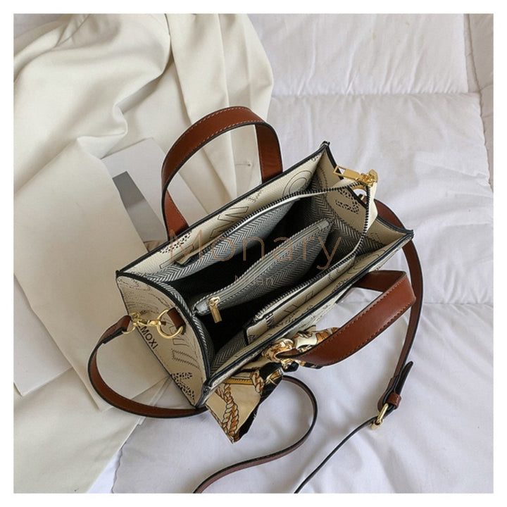 ״הילה״ - תיק צד בהיר - Monary Milan