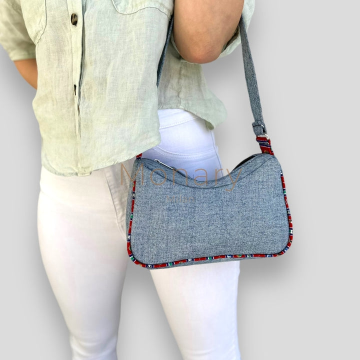 ⁨⁨⁨תיק גינס כחול ⁩⁩ - תיק Monary Milan