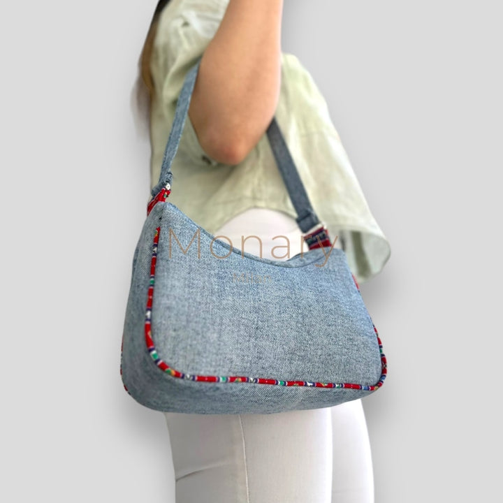 ⁨⁨⁨תיק גינס כחול ⁩⁩ - תיק Monary Milan