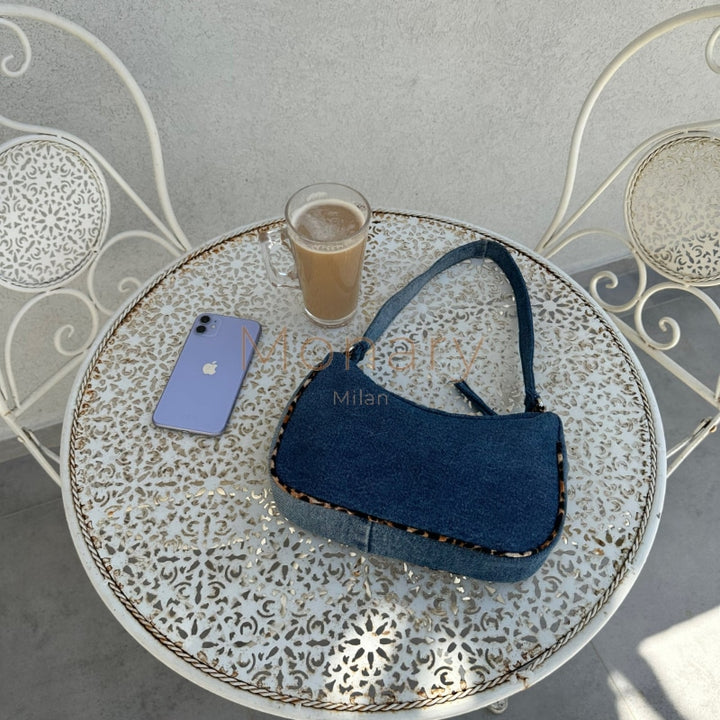 ⁨⁨תיק גינס כחול בגימור מנומר⁩⁩ - תיק Monary Milan