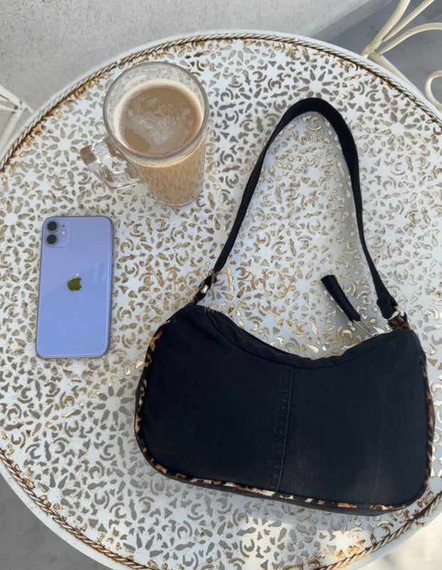 ⁨תיק גינס שחור בגימור מנומר⁩ - תיק Monary Milan